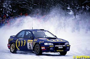 Colin McRae powers through the snow on the 1995 Rally Monte Carlo