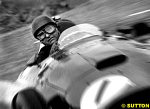 Fangio driving a Ferrari