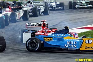 Schumacher crashes into Trulli