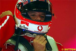 Rubens Barrichello using the HANS