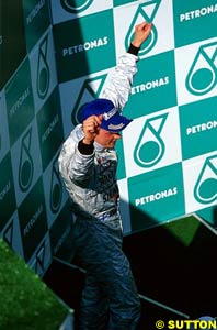 Raikkonen celebrates his first win