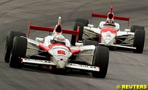 Gil de Ferran leads teammate Helio Castroneves