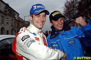 Young gun Sebastien Loeb congratulates Petter Solberg on his title