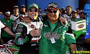 Winner Bobby Labonte celebrates with crew chief Michael 'Fatback' McSwain