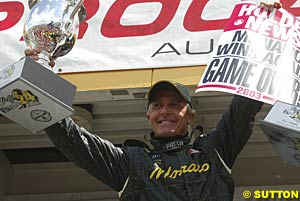 Peter Brock celebrates his tenth endurance victory at Mount Panorama