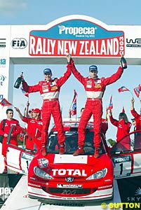 Timo Rautiainen and Marcus Gronholm celebrate victory in New Zealand