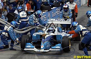 Paul Tracy makes a pit stop on his way to victory