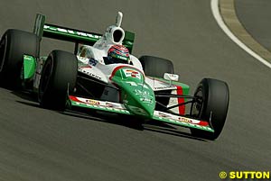 Tony Kanaan racing at Motegi before his race-ending crash