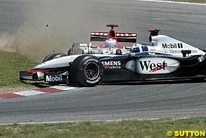 Button crashes into Coulthard