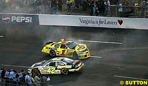 The yellow Pennzoil Chevrolet of Steve Park rebounds off the wall after bringing out the first caution