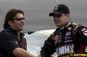 Jerry Nadeau, right, chats with Christian Fittipaldi. Nadeau is currently in a serious but stable condition after a crash at Richmond last weekend