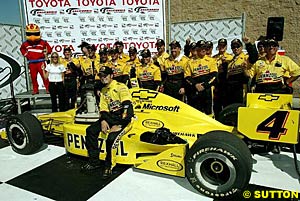 Sam Hornish celebrates with his crew after his second successive victory