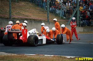 Senna push-started after Prost collided with him. Suzuka 1989