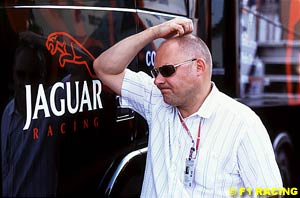 Bishop next to Jaguar's truck