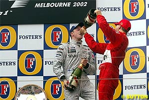 Kimi Raikkonen on his first podium, at Melbourne 2002