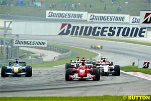 Barrichello struggles in the rain in Malaysia