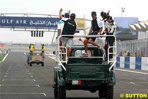 The drivers' parade in the king's Dodge Power Wagons