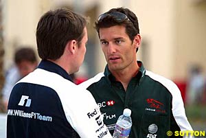 Sam Michael & Mark Webber at the 2004 Bahrain Grand Prix