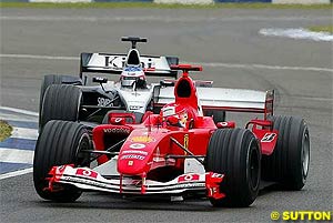 Schumacher under pressure from Raikkonen