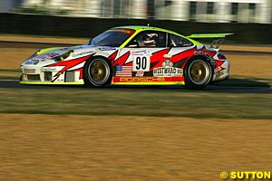 The GT class winning Porsche 996 GT3-RSR of Sascha Maassen/Jorg Bergmeister/Patrick Long