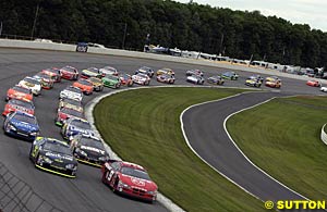 Kasey Kahne (inside) and Brian Vickers lead the field to the start