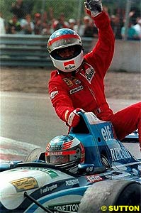 Jean Alesi celebrates his first and only GP win
