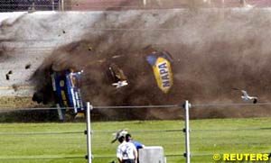 Michael Waltrip rolls down the backstretch grass