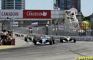 Winner Paul Tracy leads the field at the start of the race