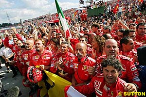 The Ferrari team celebrate the Hungarian Grand Prix race win and the World Constructor's Championship