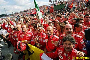 The Ferrari team celebrate the Hungarian Grand Prix race win and the World Constructor's Championship