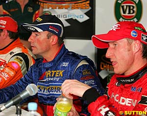 Race two winner Marcos Ambrose and race one winner Mark Skaife