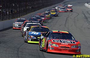 Jeff Gordon leads Elliott Sadler during the race