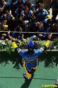 Fernando Alonso celebrates his maiden win