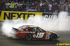 Winner Jeremy Mayfield does some smoky donuts