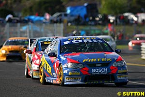 Marcos Ambrose/Greg Ritter with Russell Ingall/Cameron McLean right under his rear wing, SBR going on to take a 1-2 finish