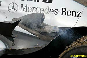 The expired engine of Kimi Raikkonen's McLaren-Mercedes