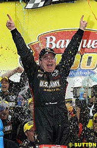 Joe Nemechek celebrates his win in Victory Lane