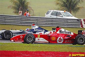 Barrichello runs wide at the beginning of the race
