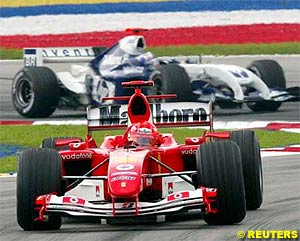 Montoya chasing Schumacher