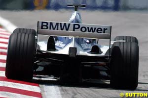 The BMW Williams attacking the curbs of Sepang