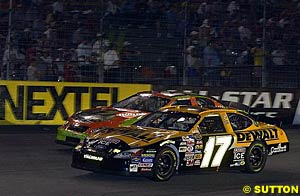 Matt Kenseth races with Tony Stewart