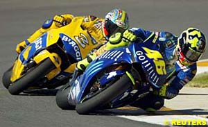 Valentino Rossi and Max Biaggi dice for the lead