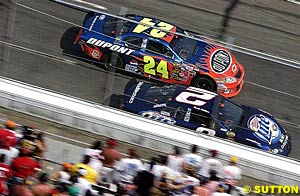 Winner Rusty Wallace battles with early race leader Jeff Gordon