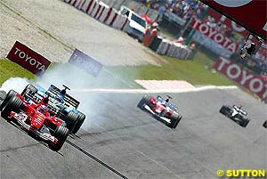 Alonso chases Barrichello
