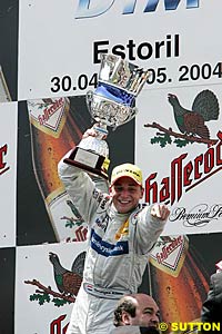 Winner Christijan Albers celebrates on the podium