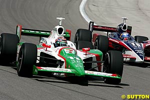 Winner Tony Kanaan battling with Buddy Rice