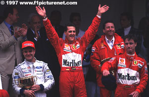 A joyful podium for Ferrari and Stewart