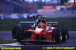 Schumacher heads Fisichella
