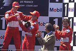 Cantoni on the podium, to the right