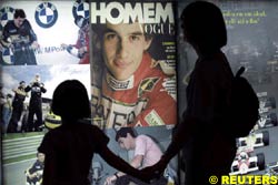 Visitors watch Ayrton Senna's photos, today in Brazil